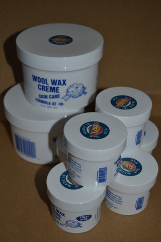 2 nine ounce jars and 6 two ounce jars Wool Wax Creme